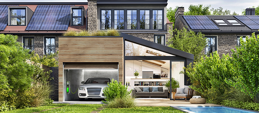 Modernes Haus mit Photovoltaik und E-Auto