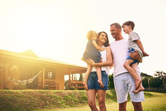 Shot of a happy family bonding together outdoors